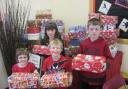 From left, Jonathan Bignall, Daisy Wilks, Samuel Illidge and Jessica Bazley with some of their Christmas gifts