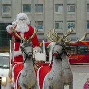 Santa with his reindeer
