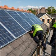 Engineers have been fitting solar panels and battery storage across Halton and the LCR.