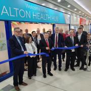 Mike Amesbury cuts the ribbon to open Halton Health Hub.
