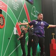 Luke Littler shows his delight with nine-dart finish in quarter-final win against Nathan Aspinall