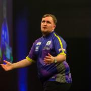 Luke Littler showing frustration in his semi-final defeat to Rob Cross in Exeter