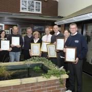 Staff at Fairview Windows with their NVQ awards