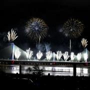 Fireworks illuminate the sky to celebrate the opening of the new Mersey Gateway