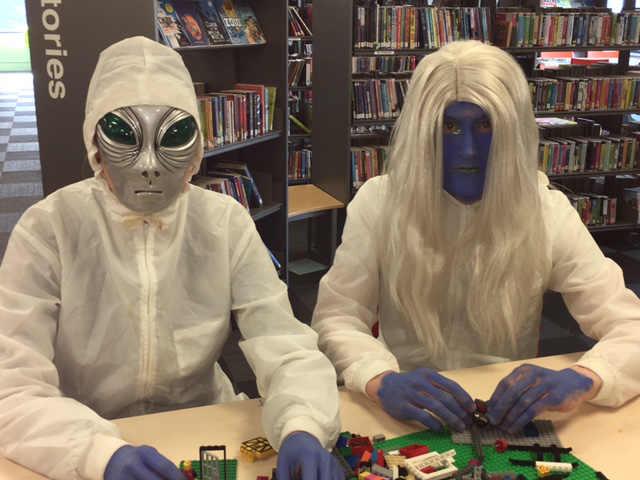 Aliens tackle Lego at one of many UFO events in the library at Runcorn Shopping Centre to tie in with the flying saucer museum