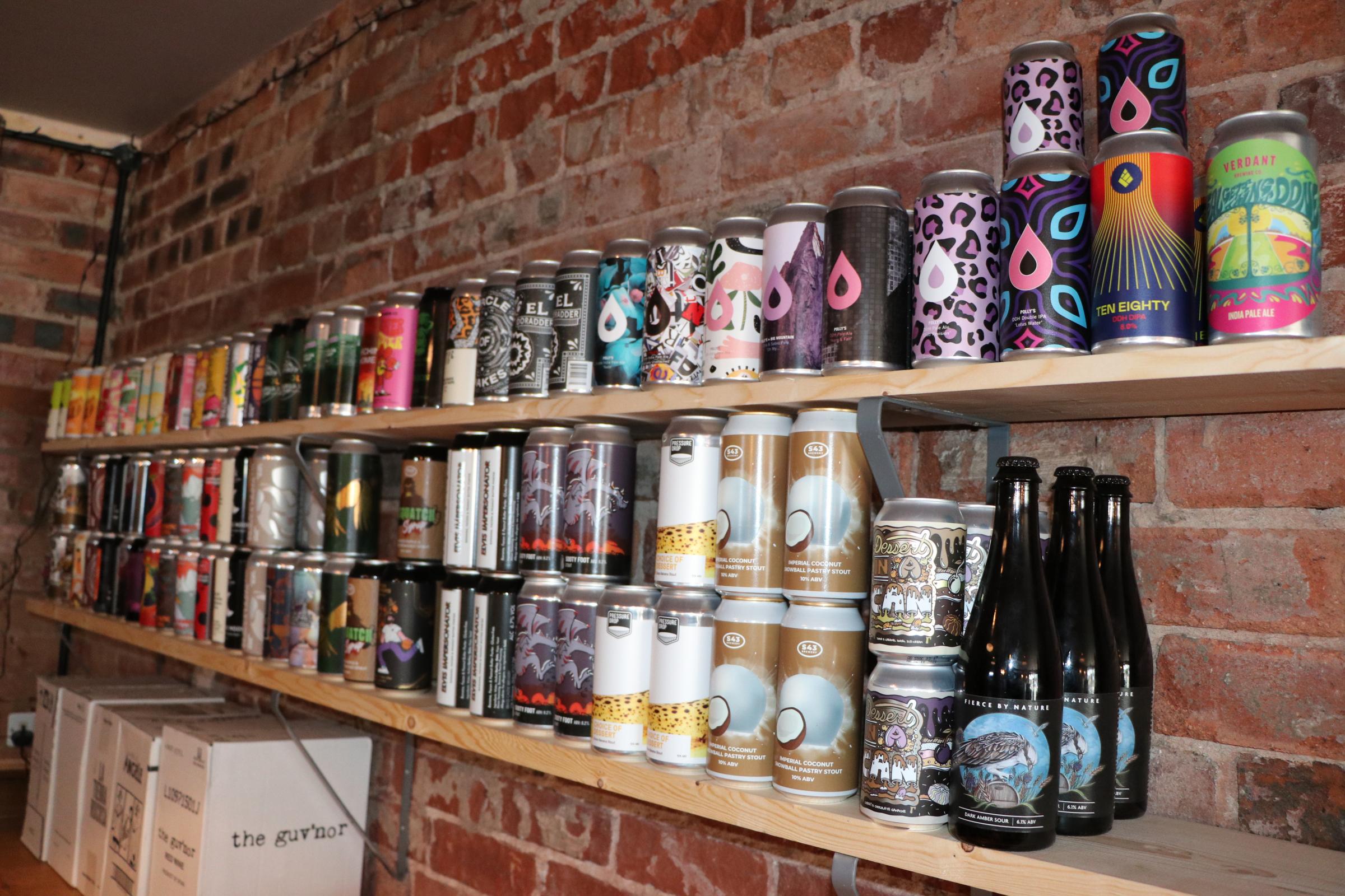 A vast array of unusual beers are lined up ready to be sold in the Bow-Legged Beagle
