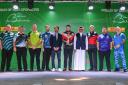 The PDC players, including Luke Littler second from right, with dignitaries  at last night's draw in Bahrain