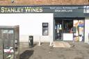 A thug threatened a shop employee with a knife at Stanley Wines in Warrington