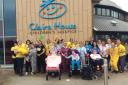 Claire House play specialists pictured with service users at the hospice