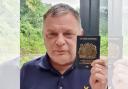Runcorn MP Mike Amesbury with his passport