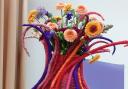 This imaginative design was created by Debbie Davies during her demonstration entitled 'Colours of Life' at Widnes Floral Art Group last year