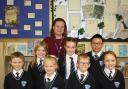 Pictured: Ditton Primary Head of School Janette Pyne pictured with proud pupils (back, from left) Caitlyn Cornes, Neive Corby and Zachary Wan, (front) Cooper Kelly, Isabella Twigg, Alfie Twigg and Ada Black