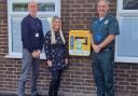 Phil Woods and Krysia Morrow, of Inglefield, and Mark Collins, of North West Ambulance Service