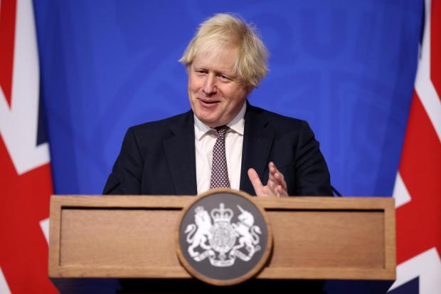 Ahead of another press conference, Boris Johnson is expected to speak on the new rules implemented to tackle the Omicron variant (PA)