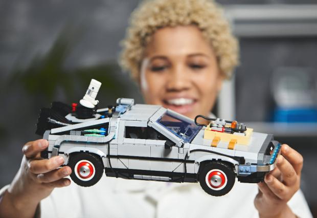 Runcorn and Widnes World: A woman holding the LEGO Back to The Future Delorean set. Credit: LEGO