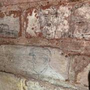 Fascinating drawings of Churchill, Hitler and FDR discovered on walls of air raid shelter