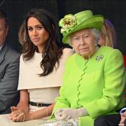 Meghan Markle and the late Queen on their visit to Runcorn