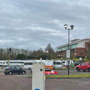 Group of traveller move onto hotel car park
