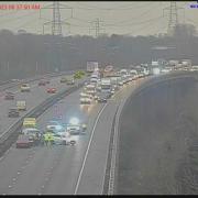 The M56 westbound in Cheshire is closed following a crash, captured on this motorway camera