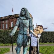 Kemik the Viking with the Childe of Hale statue in Hale Village