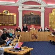 Council leader Cllr Mike Wharton addresses members at the Runcorn Town Hall meeting