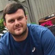 A mental health trust has responded to criticisms made by a coroner into the death of Adam Smith