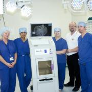 The breast services team at Whiston Hospital with the new specimen imaging system, Whiston Hospital
