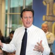 Prime Minister David Cameron at the O2 Contact Centre in Preston Brook MBA301014
