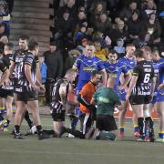 Referee Phil Bentham regains his feet after the collision during Widnes Vikings' clash with Warrington Wolves. Picture by Mike Boden