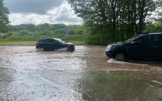 Burst water main causes flooding and long queues in Walton